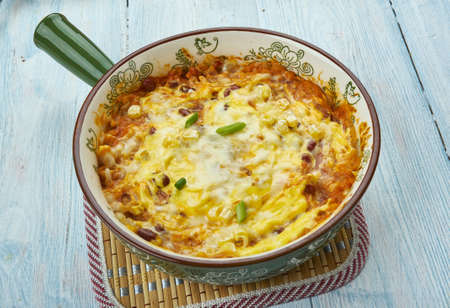 Southwest Chicken Skillet , Heat a large saute pan over medium heat. Add olive oil then the onion and peppers.の写真素材