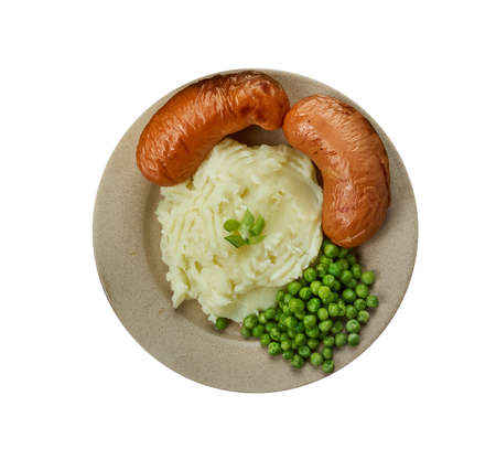 Bangers and mash, English cuisine,  traditional dish of Great Britain and Ireland comprising sausages served with mashed potatoes, Britain Traditional assorted dishes, Top view.の写真素材