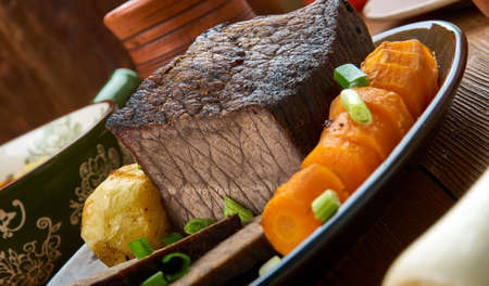 Roast Beef  roast potatoes and gravy, English cuisine, Britain Traditional assorted dishes, Top view.の写真素材