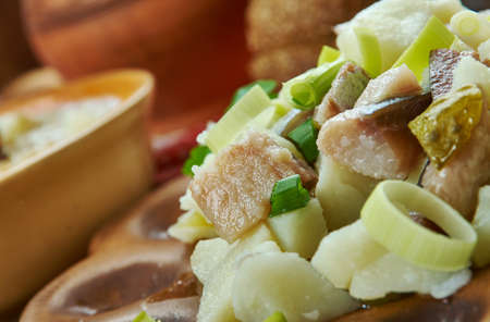 Kartupeli ar silki, Herring Potato Salad, Latvian cuisine, Traditional assorted dishes, Top view.の写真素材
