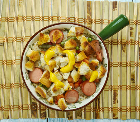 chicken sausage wild rice casserole,  rice, add cream of mushroom soup, chicken, vegetables, cream, cooked onion and celery, and salt and pepper.の写真素材
