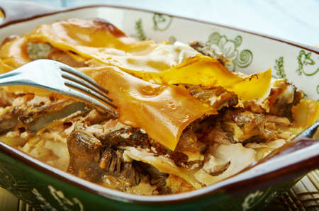 Cowboy Lasagna,  of  beef, olives, mushrooms and onions is combined with spaghetti sauce and Italian seasoningsの写真素材