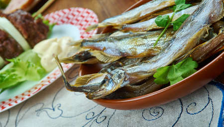 Soused herring, Dutch cuisine, Traditional assorted dishes, Top view.