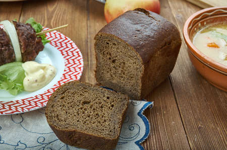 Ontbijtkoek,  Dutch and Flemish spiced cake, Dutch cuisine, Traditional assorted dishes, Top view.