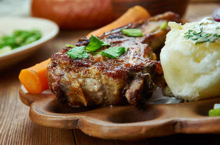 Stekt flesk, of fried pork belly and generally served with potatoes and a white sauce, Norwegian  cuisine,  Traditional assorted dishes, Top view.の写真素材