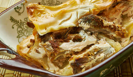 Cowboy Lasagna,  of  beef, olives, mushrooms and onions is combined with spaghetti sauce and Italian seasoningsの写真素材
