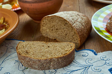 Homemade Limpa, Swedish rye bread, Swedish homemade cuisine, Traditional assorted dishes, Top view.
