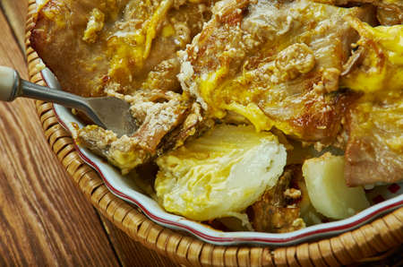 Pork Chops  Scalloped Potatoes Casserole  ,delicious hearty mealの写真素材