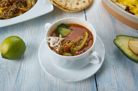 Cooker Tex-Mex Chicken Soup, Tex-Mex  cuisine, Traditional assorted dishes, Top view.