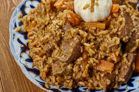Kyrgyz plov from red rice Uzgen, Central Asian cuisine