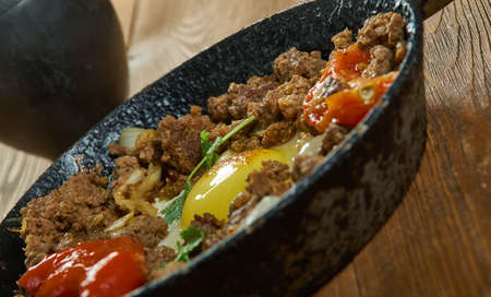 Makhlama Lahm - Iraqi Eggs with Lamb and Tomatoes, breakfast dish, ground lamb is sautÃ©ed with onions, tomatoes, and parsley, seasonedの写真素材