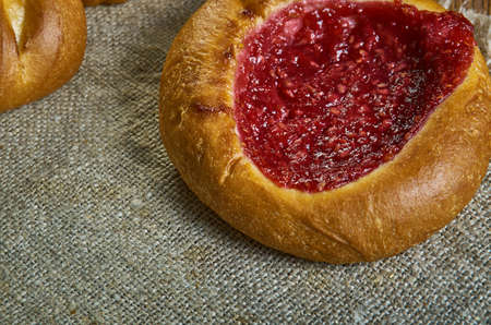 Vatrushka, Russian traditional pies with raspberry jam , assorted pastry: dishes, Top view.の写真素材