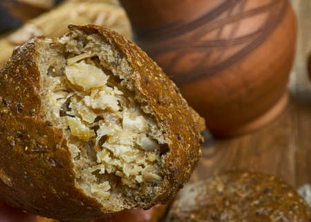 Pirozhki, Russian traditional pies  with onions and eggs , assorted pastry: dishes, Top view.の写真素材