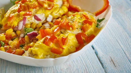 One Dish Queso Chicken Bake, packed with creamy queso rice, green chiles and taco-seasoned chicken breastsの写真素材