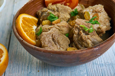 Lamb Tagine With Raisins, Almonds, Moroccan cuisine; assorted dishes; Top vie;