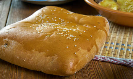 Ossetian Meat Pie, Caucasian  cuisine, Traditional assorted dishes, Top view.の写真素材