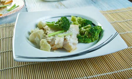 Poached hake served  with vinaigrette, close up