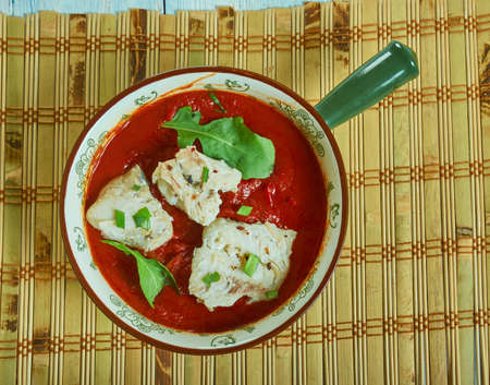 Spanish Cod One Pot, Cod simmered in chorizo and saffron spiked broth with chick peas, lemon and...