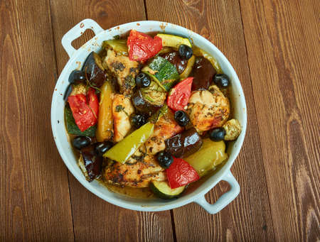 Greek Chicken Traybake,packed with roasted peppers, tomatoes, olives, red onion and chicken.の写真素材