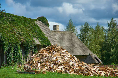 Belarusian Country village house in sunny dayの写真素材