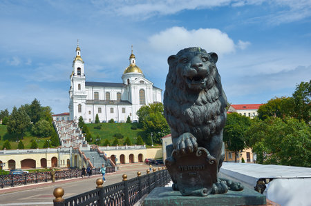 Vitebsk city in Belarus, Lion sculpture on Pushkin bridge and Assumption cathedral . August 8, 2019のeditorial素材