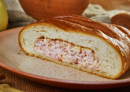 Scandinavian stuffed pies with ham and cheese