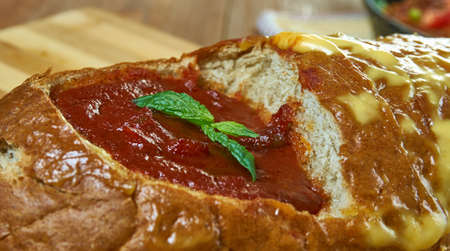 Roasted Tomato Soup and Grilled Cheese Bread Bowl close up 