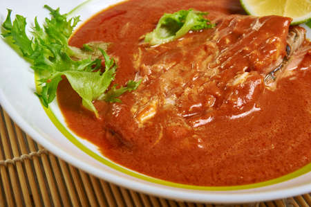 Poached Salmon in Coconut Lime Sauce,  close up Thai coconut curry sauce 