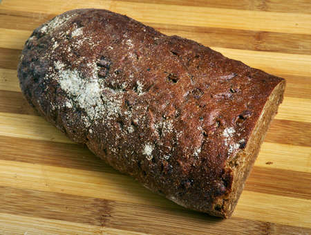American pumpernickel, typically heavy, slightly sweet rye bread traditionally made with sourdough...