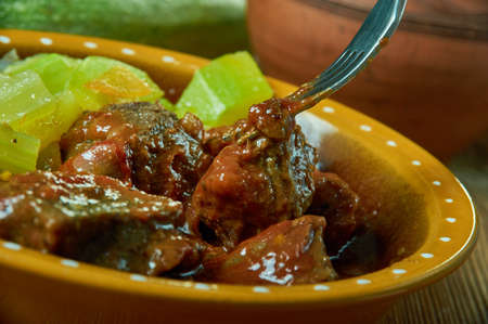 Goat and tomato bredie, South African stew flavoured with ginger, cardamom, cloves and chilli.の写真素材