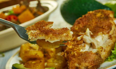 Jerk spiced fish, Caribbean cuisine, Traditional assorted  dishes, Top view.