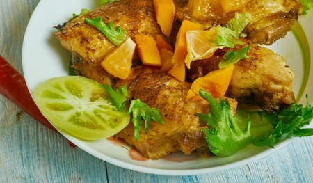Jerk chicken thighs, Caribbean cuisine, Traditional assorted  dishes, Top view.