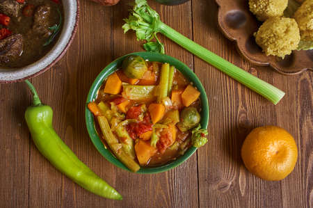Daraba, dish prepared with okra, tomatoes, sweet potatoes, greens, peanut butter, Chadian cuisine, Traditional assorted African dishes, Top view.の写真素材