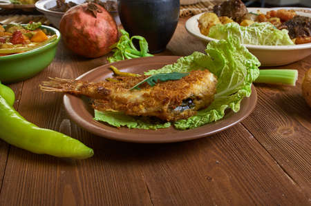 Roasted Nile perch, Chadian cuisine, Traditional assorted African dishes, Top view.