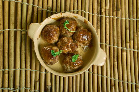 Honey-Balsamic BBQ Meatballs are sticky, sassy, and saucy. close up