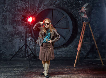 Beautiful girl, model in the style of a steampunk in a beautiful creative studio. Fashion, styleの写真素材