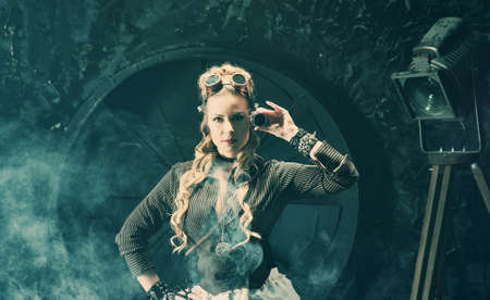 Beautiful girl, model in the style of a steampunk in a beautiful creative studio. Fashion, styleの写真素材