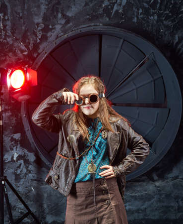 Beautiful girl, model in the style of a steampunk in a beautiful creative studio. Fashion, styleの写真素材