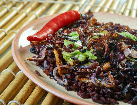 Caramelized Red Onion Black Rice with Tamarind - Imli chawal,  common rice preparation in the South Indianの写真素材