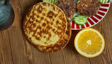 Warqi Paratha,  Indian flatbread, Awadhi cuisine, Traditional assorted Indian  dishes, Top view.