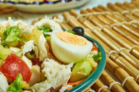 Portuguese salad with cod, potatoes - Bacalao or Bacalhoadaの写真素材