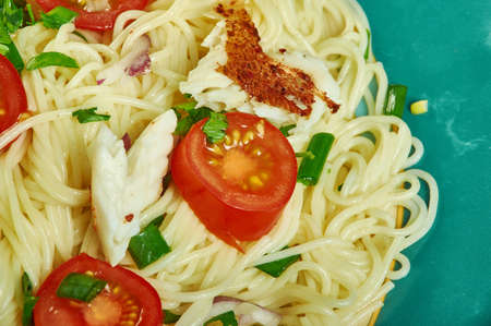 Cod puttanesca with  spaghetti,  combined spaghetti with white fish and an easy puttanesca sauceの写真素材