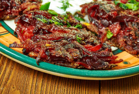 Beetroot fritters, pan fritters made with a sharp sauceの写真素材