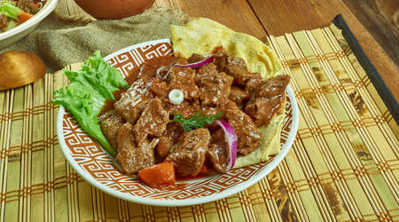 Mutton Lazeez, Mutton Chops Masala, cooked in mild spices, mixed in yoghurt and cream.