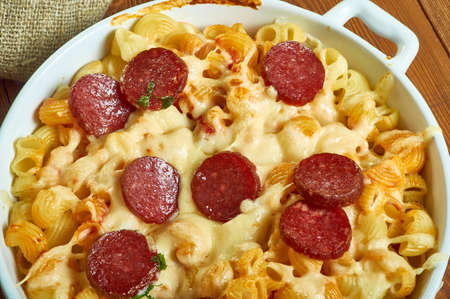 Sausage chorizo ragu  spinach pasta bake, combines creamy cheese sauce and tomatoes