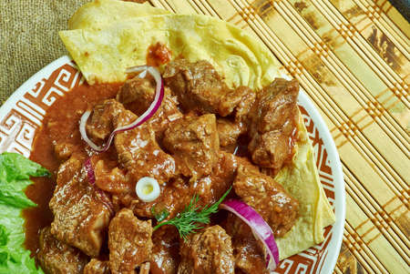Mutton Lazeez, Mutton Chops Masala, cooked in mild spices, mixed in yoghurt and cream.