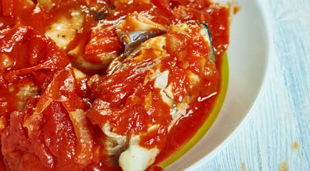 Trinidadian fish stew, Caribbean Fish ith marinated red snapper and tilapia, infused with spices,...