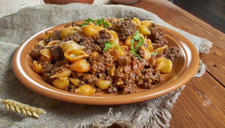 Chili mac - dish prepared using chili and macaroni as primary ingredients, which is often topped or intermingled with cheese. cuisine of the Midwestern United States,の写真素材