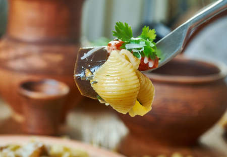 Caponata pasta - Sweet-sour eggplant caponata makes a great sauce for Conchiglie, Sicilian dishesの写真素材