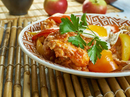 Pollo alla Marengo - French dish consisting of a chicken sautÃ©ed in oil with garlic and tomato,...